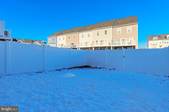 view of yard covered in snow