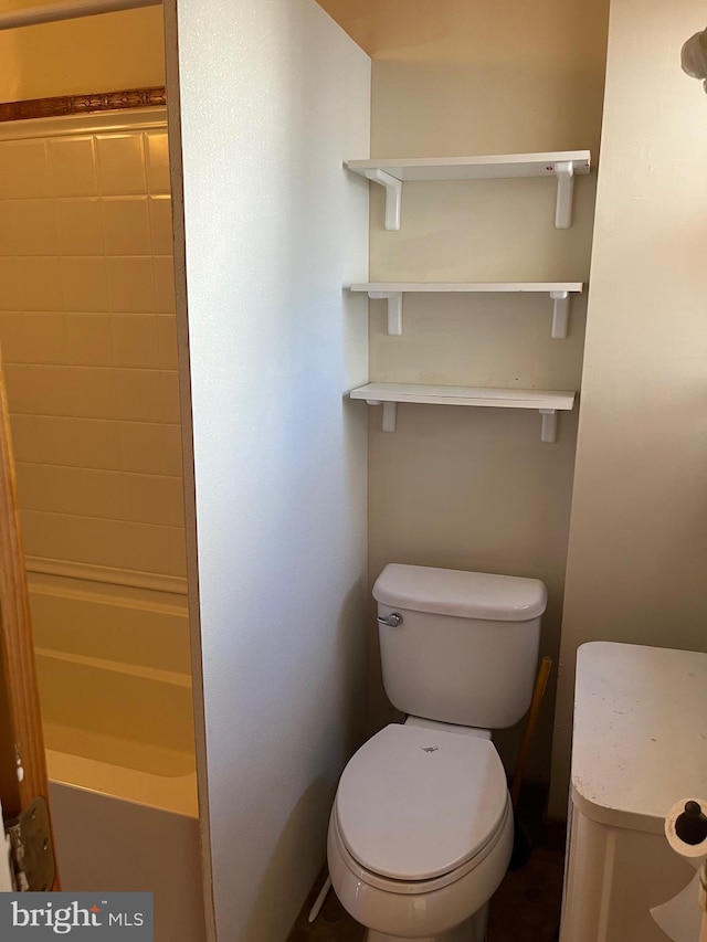 bathroom featuring toilet