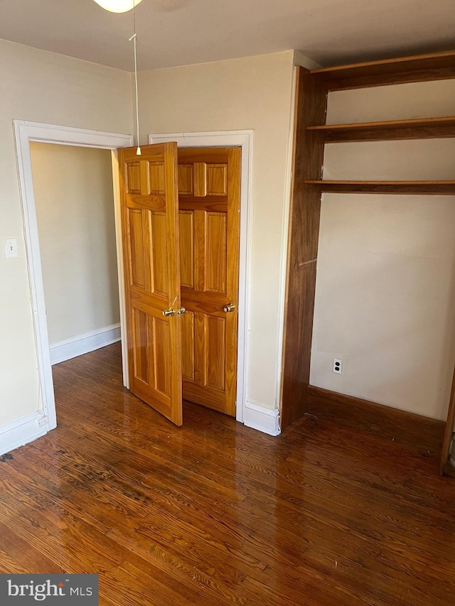 interior space with dark wood-type flooring