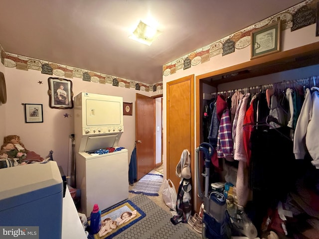 303 16th St, Saxton, PA 16678 - clothes washing area with stacked washer and clothes dryer