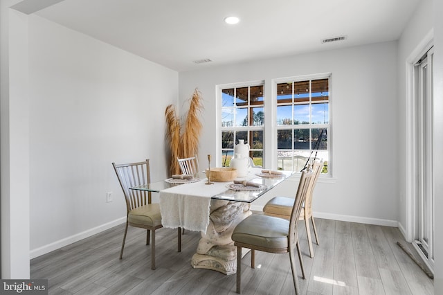 dining room featuring light hardwood / wood-style flooring