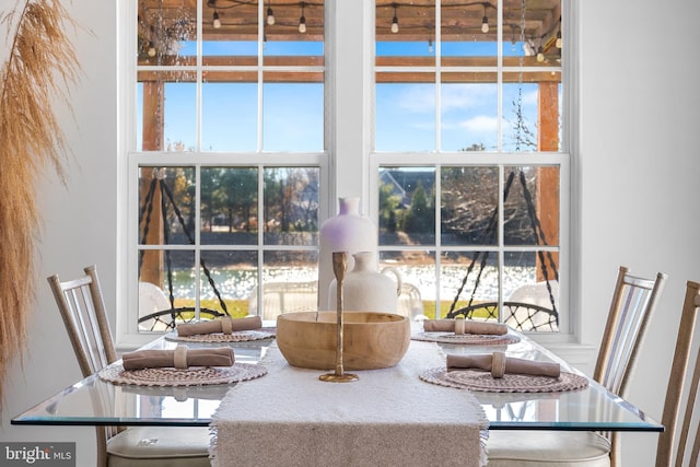 unfurnished dining area featuring a healthy amount of sunlight