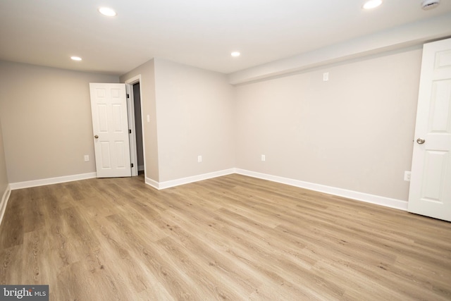 basement featuring light hardwood / wood-style floors