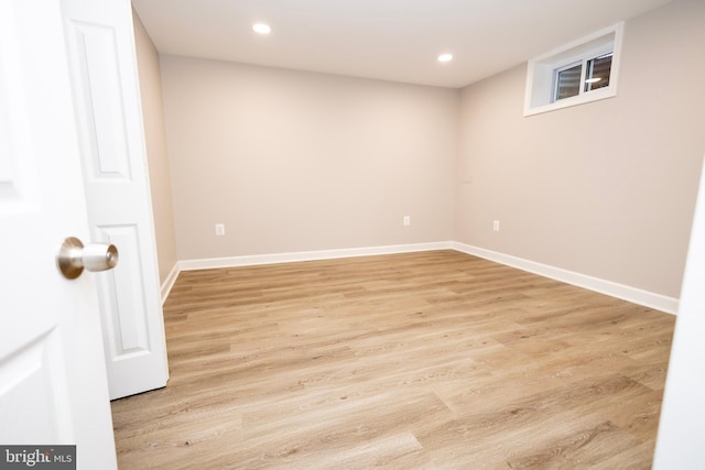 spare room featuring light wood-type flooring