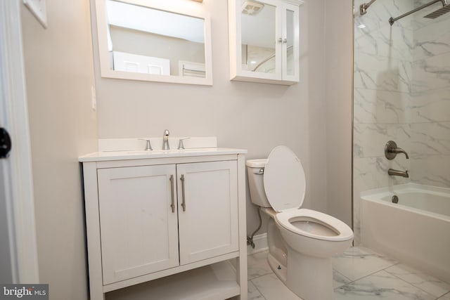 full bathroom featuring toilet, vanity, and tiled shower / bath