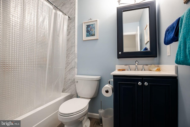 full bathroom featuring vanity, toilet, and shower / bathtub combination with curtain