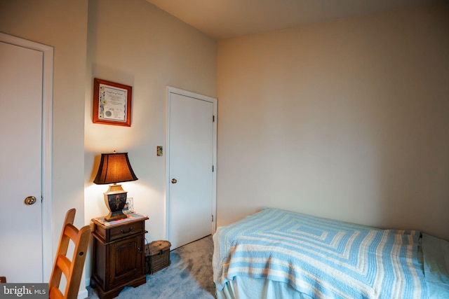 bedroom with light carpet