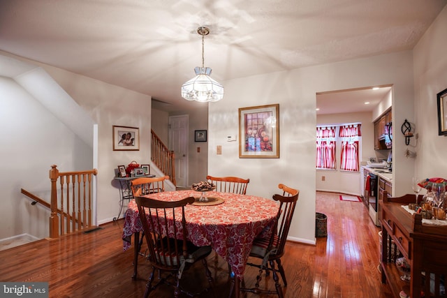 dining room featuring dark hardwood / wood-style flooring