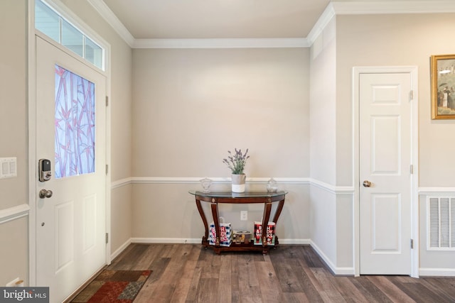 foyer featuring ornamental molding and dark wood-type flooring