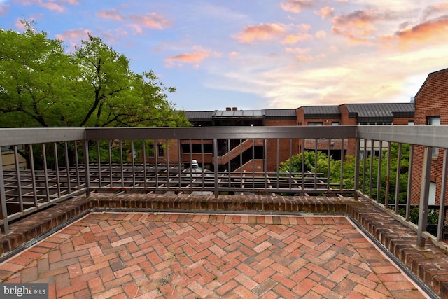 view of patio terrace at dusk