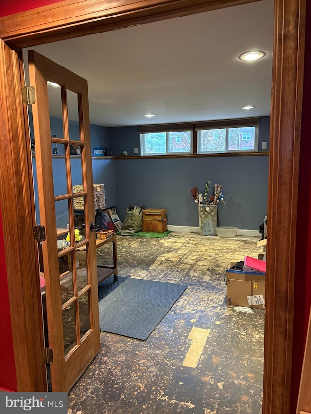 interior space with carpet flooring and plenty of natural light