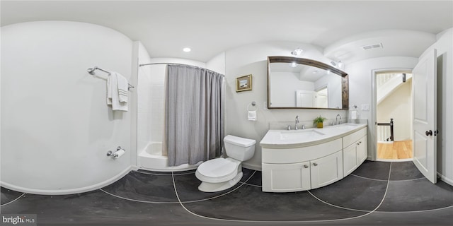 full bathroom with tile patterned floors, shower / bath combination with curtain, toilet, and vanity