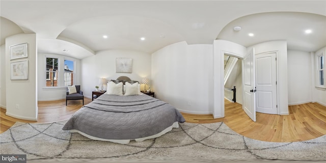 bedroom featuring hardwood / wood-style floors