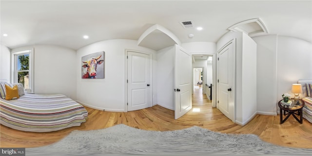 bedroom featuring light hardwood / wood-style floors