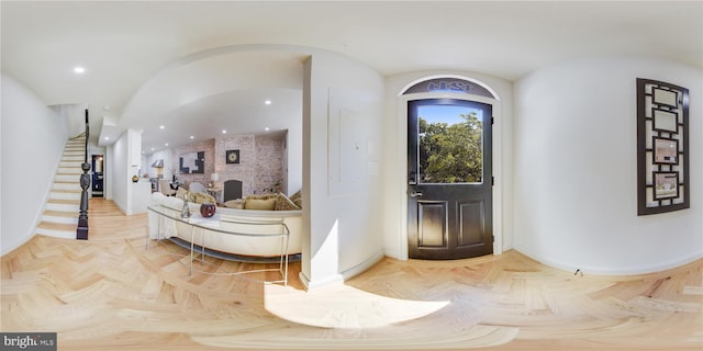 foyer featuring light parquet floors