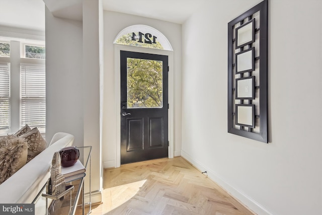 entryway featuring light parquet floors