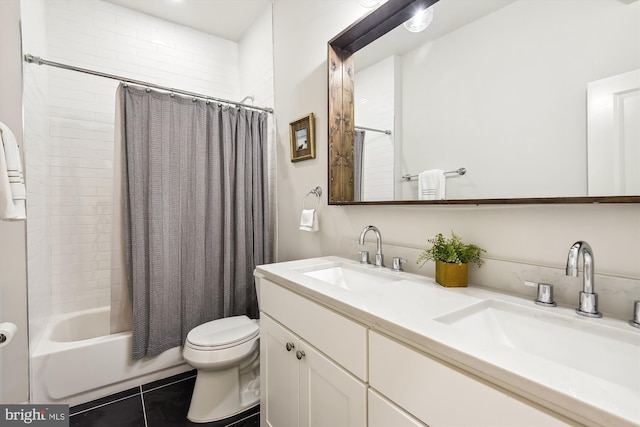 full bathroom with tile patterned floors, shower / bath combination with curtain, toilet, and vanity