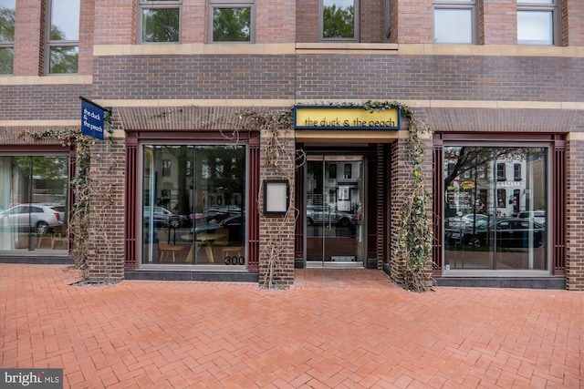 entrance to property with a patio area