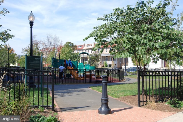 view of home's community with a playground