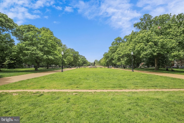 view of home's community featuring a lawn