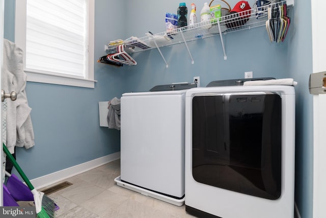 laundry area featuring washer and clothes dryer