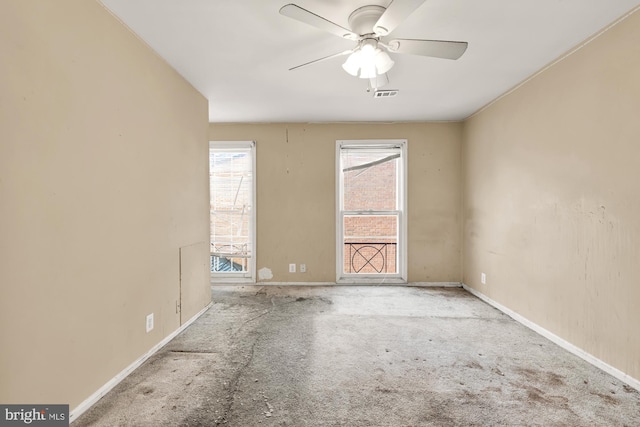 carpeted empty room with ceiling fan