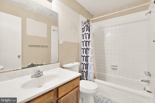 full bathroom with vanity, toilet, and shower / bath combo with shower curtain