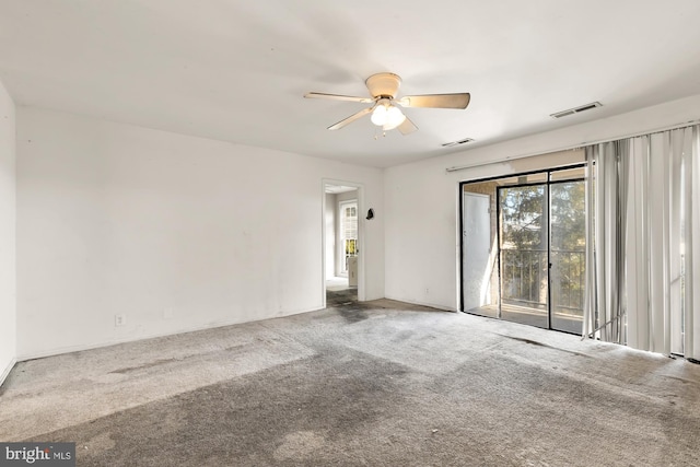 unfurnished room featuring carpet and ceiling fan