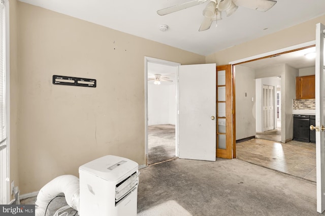 interior space featuring ceiling fan and a closet