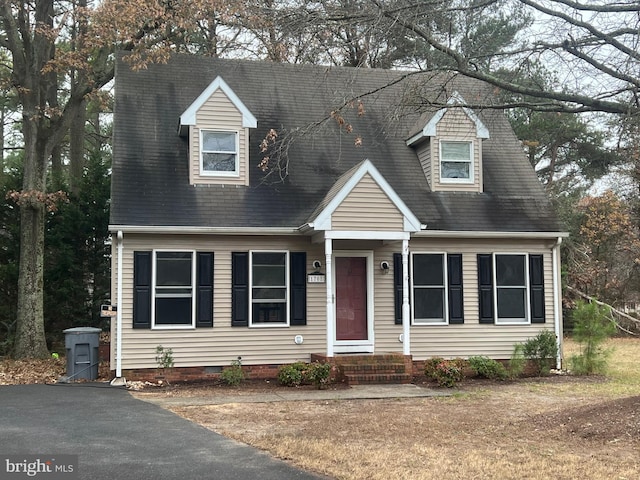 view of new england style home