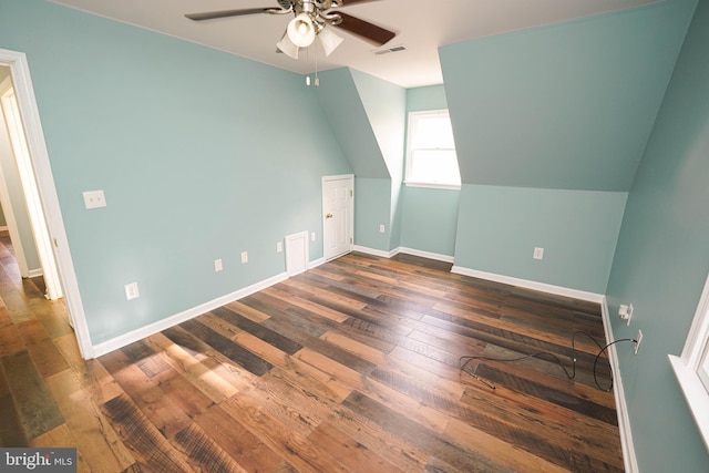 additional living space with ceiling fan and dark hardwood / wood-style flooring