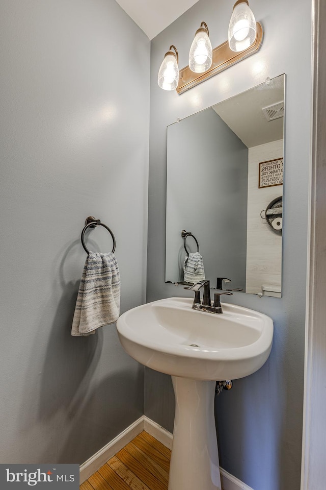 bathroom featuring hardwood / wood-style floors