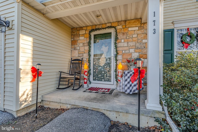 entrance to property with covered porch