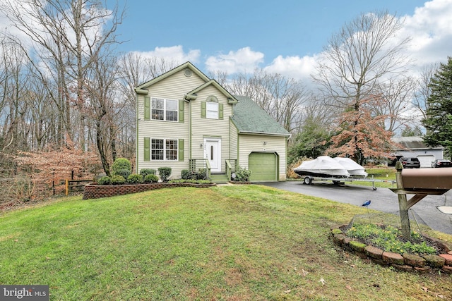 view of front property featuring a front lawn and a garage