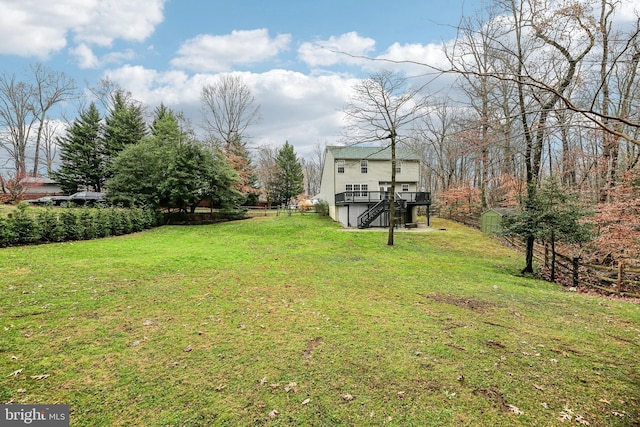 view of yard with a deck