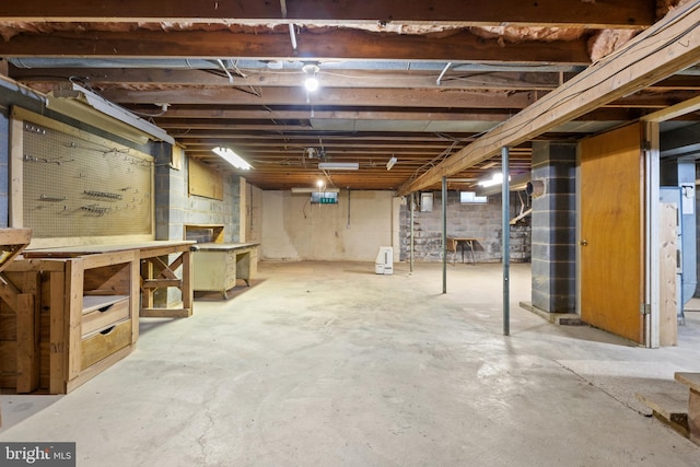 basement with a workshop area