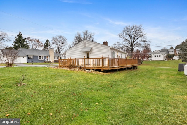 view of yard with a wooden deck