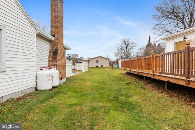 view of yard with a wooden deck