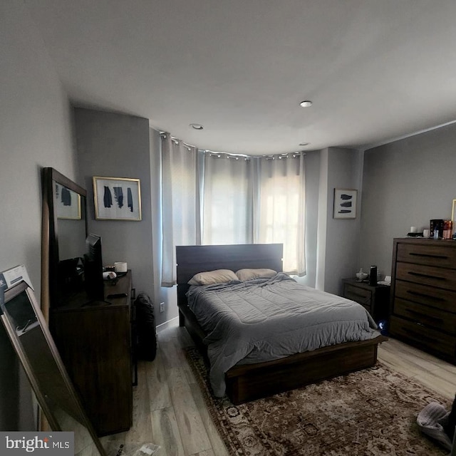 bedroom featuring light hardwood / wood-style flooring