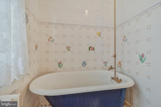 bathroom featuring a tub to relax in