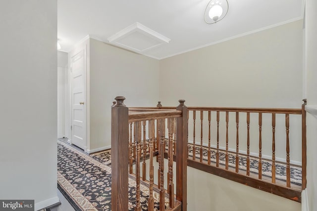 hallway featuring crown molding