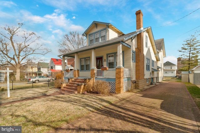 view of front of home featuring covered porch