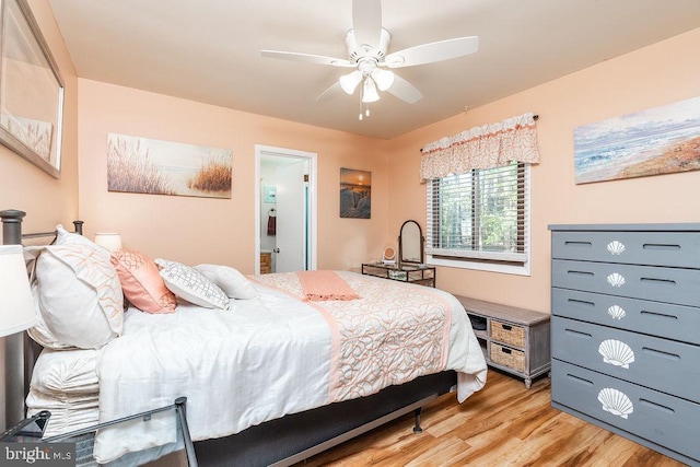 bedroom with ceiling fan and light hardwood / wood-style flooring