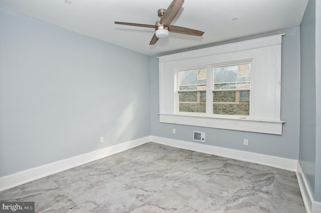 unfurnished room featuring ceiling fan