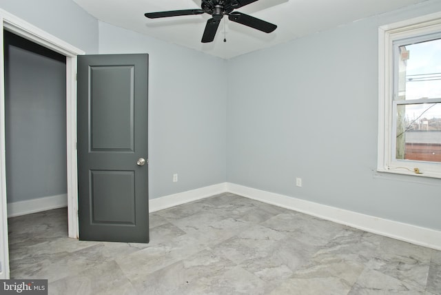 unfurnished bedroom with ceiling fan