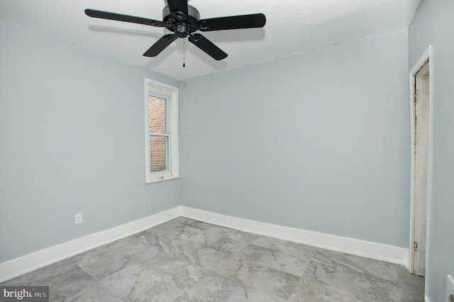 unfurnished room with ceiling fan