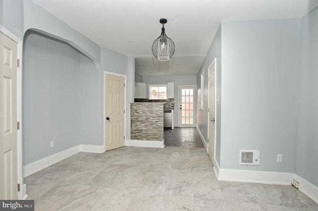 interior space with a notable chandelier