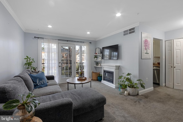 carpeted living room with crown molding