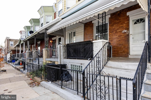 view of property exterior featuring a porch