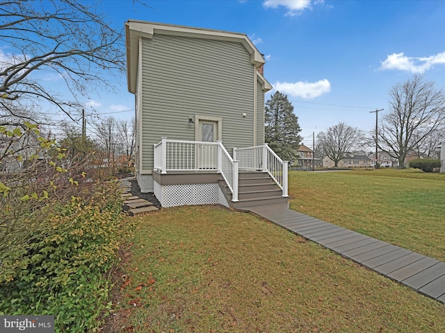 exterior space featuring a lawn